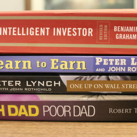 A,Stack,Of,Four,Books,On,Investing,,For,Beginners.